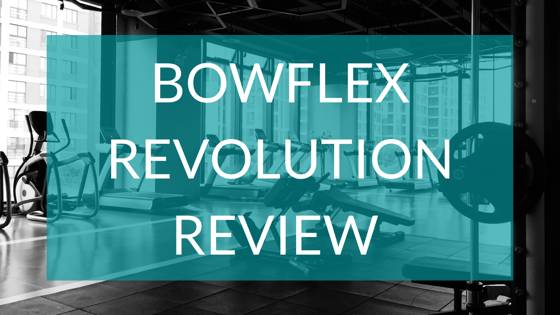 Bowflex Revolution Review text in front of gym background